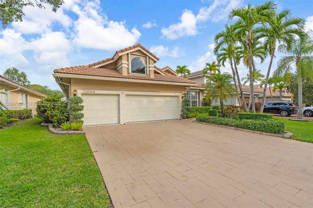 Photo of 11834 Highland Pl, Coral Springs, FL 33071 (MLS # A12007630)