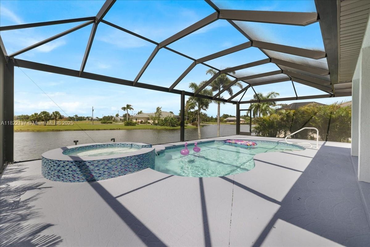 This lakefront gem offers stunning views from the living room, lanai, owner’s suite, & guest room. Enjoy a pool, spa, & a metal roof with a recent 4-point & wind mitigation report. Life-proof luxury vinyl flooring in the living room, kitchen, & owner’s suite. Relax on the covered lanai with serene wildlife views. The sprinkler system draws from the lake. The owner’s suite features sliders to the pool & a beautifully upgraded bath with a tiled walk-in shower and double sinks. Golf cart to Burnt Store Marina for dining, or enjoy the nearby park & 18-hole golf course. Upgrades: Dishwasher 2022 , A/C 2022, flooring 2024, pool resurfacing/tile, & full interior/exterior paint 2022. Watch the virtual tour!