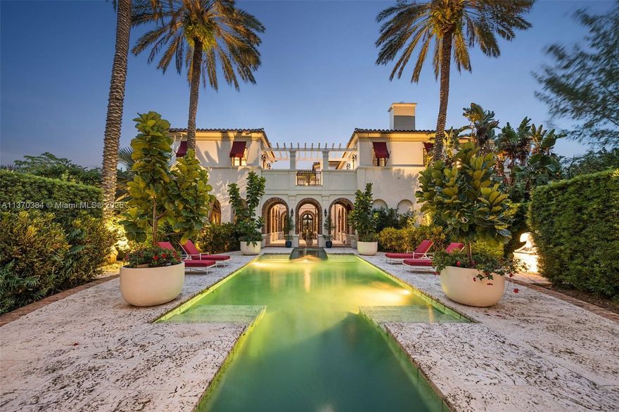 Experience unparalleled luxury at this magnificent 2-acre peninsula estate within the exclusive gated community of Journey's End.  Tuscan-inspired villa encompassing 12,159 SF of living space, the ultimate in waterfront living.  Boasting 7 beds / 8.2 baths, the home exudes sophistication with custom millwork, imported marble floors, and a gourmet kitchen equipped with top-of-the-line appliances.  Over 500 feet of unobstructed waterfrontage with no bridges to the bay, providing effortless ocean access.  Boasting a movie theater, multiple terraces, expansive outdoor living spaces perfect for entertaining.  A stunning pool and cabana complement the lush landscaped grounds, a private dock for a yacht. A rare opportunity to own a piece of paradise.