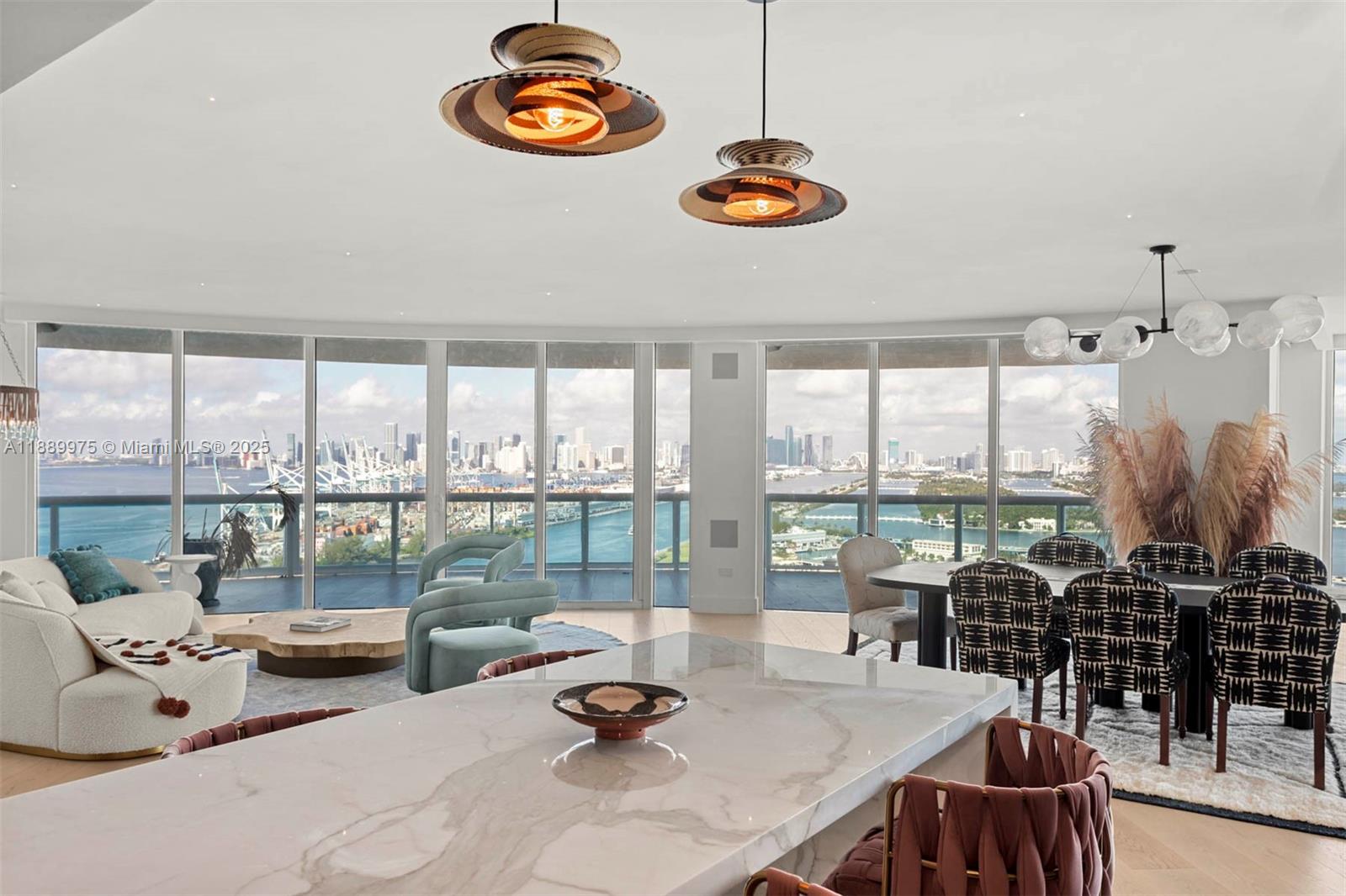 Completely renovated and spanning 3,365 SF+/-, this 3 bedroom, 3 full and 1 half bathroom corner residence offers private elevator entry and 360° views of the ocean, bay, skyline, and Government Cut. Expansive wrap-around terraces and floor-to-ceiling glass create a seamless connection to the breathtaking vistas. With full-service amenities including pool, fitness center, valet, and 24-hour security, this South Pointe gem defines Miami Beach luxury.