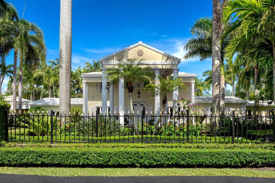 Within the highly coveted gated community of Pinecrest Grove lies a remarkable classic 8,902 Sq. Ft. residence on 2.5 acres of spectacularly landscaped grounds. This 6 bedroom and 8.5 bath home offers beautiful, light-filled living areas with custom built-ins, French doors and polished wood floors, including formal living and dining rooms, wood-paneled library, chef's kitchen and family room. The main suite includes a seating area, marble bath with jacuzzi, two showers, and a spacious walk-in closet.  Outdoor features include a tennis court, pool, patio, summer kitchen, three charming pergolas, and a Koi pond bordered by bonsai trees. Truly the ultimate haven, with a solar water heater system, 5-car garage and convenient proximity to schools, shops and restaurants.