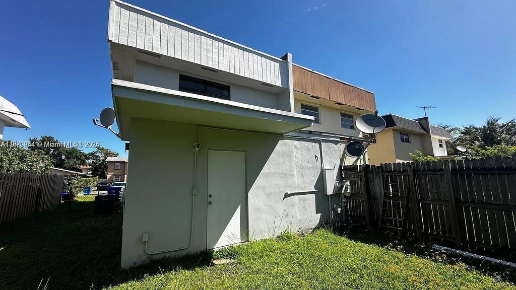 Photo of 7956 SW 6th St #1, North Lauderdale, FL 33068 (MLS # A11870044)