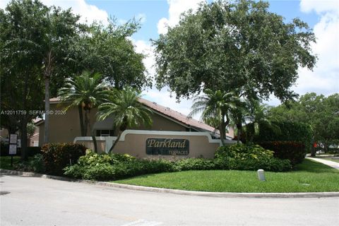 Photo of 6200 NW 74th Ct, Parkland, FL 33067 (MLS # A12011759)