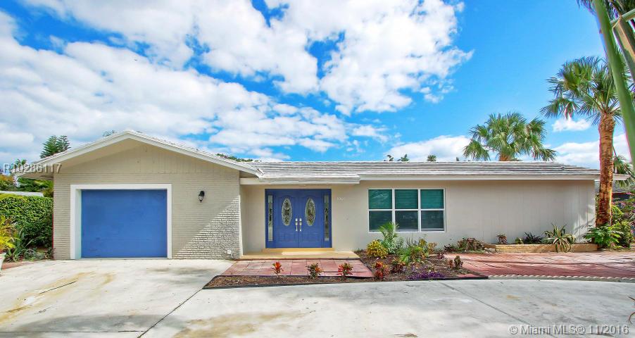 Adorable 3 bedroom 2 bathroom remodeled pool home on a huge lot with circular driveway in the highly desirable city of Palm Beach Gardens. Foyer entry opens to a thoughtfully designed floor plan with large rooms that each open to the gourmet kitchen with new granite countertops, custom cabinets, subway tile backsplash and stainless steel appliances. All three bedrooms are most generous in size with bathrooms that have been fitted with custom flooring, cabinetry and tile work. Natural light floods each roo