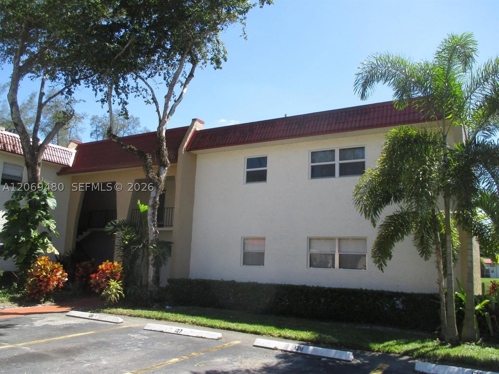 Photo of 212 Lake Frances Dr #1, West Palm Beach, FL 33411 (MLS # A12069480)