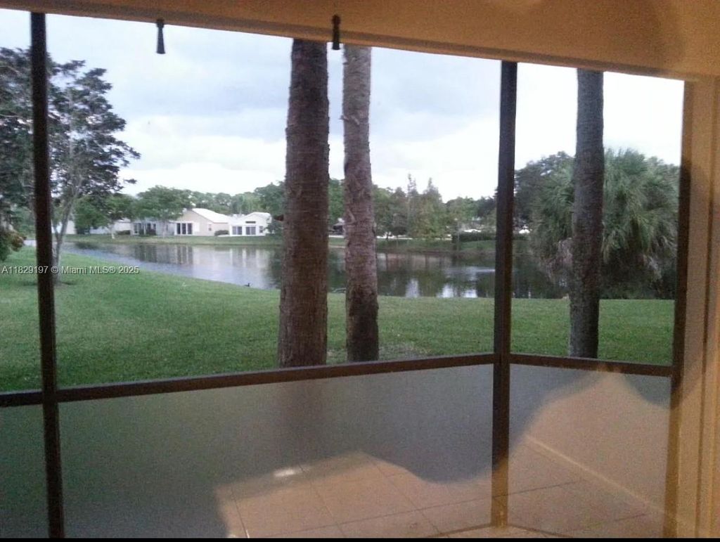 Photo of 200 Crosswinds Dr #C1, Green Acres, FL 33413 (MLS # A11829197)