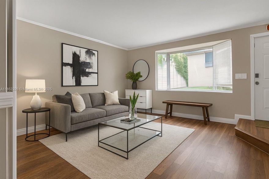 BEST PRICED 2/1 IN THE COMMUNITY! Beautifully renovated 2BR/1.5BA townhome in the gated community of Dadeland Cove! Enjoy updated floors, a bright open kitchen with stainless steel appliances, in-unit washer/dryer, and a cozy loft in the primary bedroom for extra storage or a reading nook. The inviting back patio is perfect for your organic garden and creating an indoor-outdoor living vibe with the living room doors wide open. Includes 2 assigned parking spots, plenty of guest parking, a community pool, and 24/7 security. HOA covers basic cable, roof maintenance, termite treatment, and bee removal. Prime location near great schools, Target, Whole Foods, Downtown Dadeland, expressways, and the Metro station. Don’t miss this one!