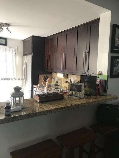 SPANISH TRACE CONDO - Residential