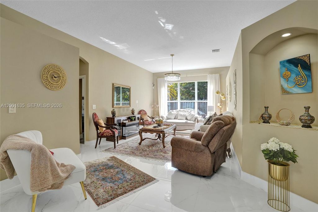 Photo of 4286 NW 42nd Ter, Coconut Creek, FL 33073 (MLS # A12001635)