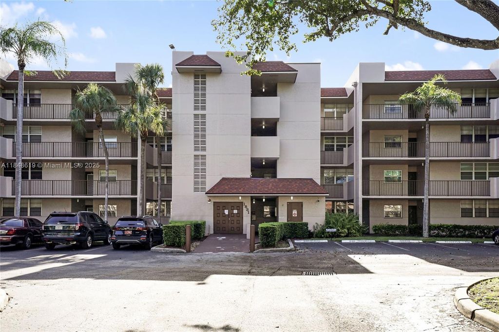 Photo of 1831 Sabal Palm Dr #404, Davie, FL 33324 (MLS # A11848619)