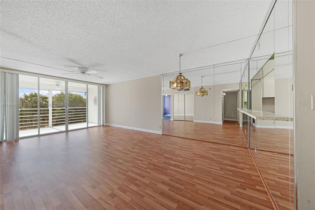 Photo of 1831 Sabal Palm Dr #404, Davie, FL 33324 (MLS # A11848619)