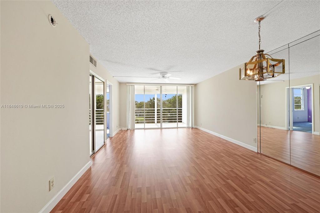 Photo of 1831 Sabal Palm Dr #404, Davie, FL 33324 (MLS # A11848619)