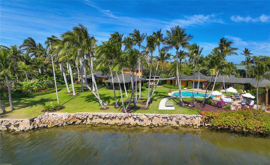 Rare opportunity on Jupiter Island! This stunning estate sits on 1.88 acres with an impressive 454  feet of Intracoastal frontage and a private beach area. The expansive residence features 7 bedrooms, 6 baths, and offers the potential to expand by 2,486 sq. ft. Enjoy breathtaking water views, a sparkling pool, and the ultimate in privacy and exclusivity. A true waterfront paradise!