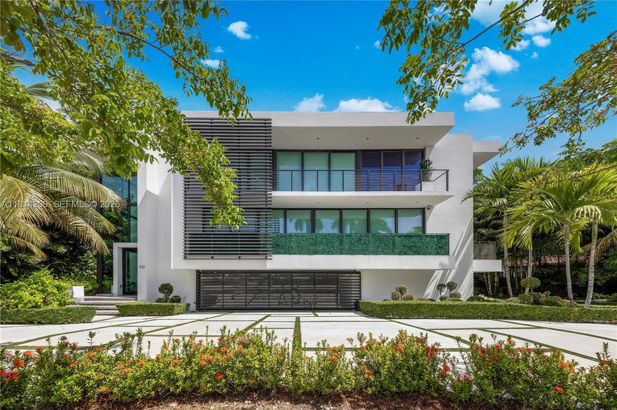 A modern masterpiece by award-winning architect Ralph Choeff, located on the coveted, guard-gated Hibiscus Island. Newly completed, this residence impresses with a dramatic 20-ft glass foyer, floating staircase, and wide-plank white oak floors. Natural light fills the open layout, blending indoor and outdoor living. The sleek Mia Cucina kitchen features Wolf & Sub-Zero appliances. Additional highlights include an Apple smart home system, private elevator, gym, and sauna—offering elevated comfort and ease. The expansive primary suite includes dual en suite baths and custom walk-in closets, while the rooftop terrace captures 360° views of the Miami skyline. Priced at the lowest price per square foot on the islands—exceptional value in one of Miami Beach’s most exclusive enclaves.