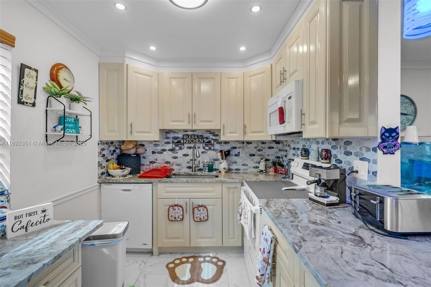 Turnkey 2-bed/2-bath condo in the peaceful community of Kings Point, a premier 55+ gated community in Delray Beach. This inviting, updated home features a bright open layout, modern kitchen with stainless steel appliances, walk-in closet, in-unit washer/dryer, renovated bathrooms and a serene enclosed balcony. Enjoy this beautiful home with timeless elegance and resort-style amenities including clubhouses, pools, golf, tennis, fitness center, theater, café, and free shuttle service.