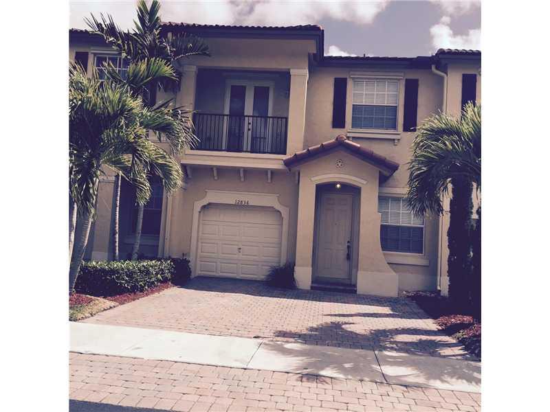 Impeccable 2 story, 3 bedroom, 2 1/2 bathroom townhouse located in Courts at Tuscany. Ideally located across from the pool and clubhouse. Impressive pool view from the 2nd floor. All rooms freshly painted. New laminate floors on 2nd floor and living ro om. Large master suite has ceiling fan, with extra large closet. Includes all appliances. Fenced backyard with brick pavers, accordion shutters on the 2nd floor. 1-car garage, Low HOA fees, pool, gym & playground.