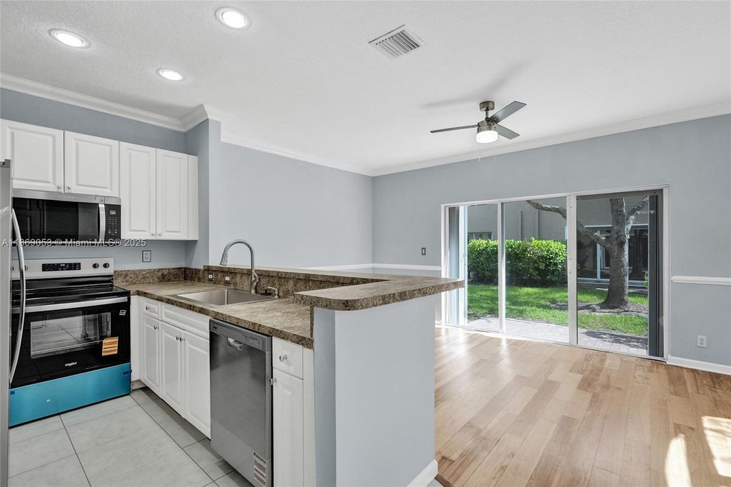 Photo of 3128 Coral Ridge Dr #3128, Coral Springs, FL 33065 (MLS # A11869053)