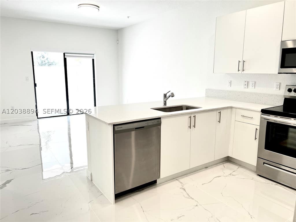 Photo of 15925 SW SW 2 Pl, Pembroke Pines, FL 33027 (MLS # A12038894)