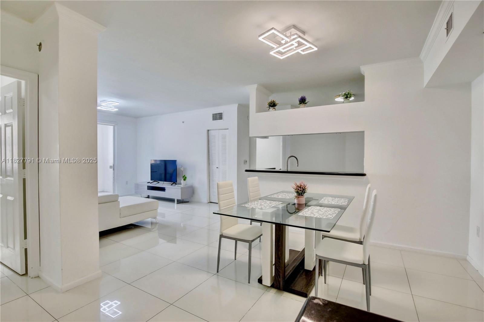 Live the Sunny Isles lifestyle at Porto Bellagio! This 2-bed, 2-bath condo offers resort-style amenities including a waterfront pool, modern gym, clubhouse, business center, and lush landscaped grounds. Located on the 3rd floor with assigned parking just steps from your door, no elevator needed. Enjoy a private balcony with peaceful courtyard views, in-unit washer and dryer, impact windows and door, and a functional layout ideal for both end-users and investors. Just a short walk to the beach, restaurants, shops, and A-rated schools. Low HOA, no special assessments. Don’t miss this opportunity—book your private showing today!