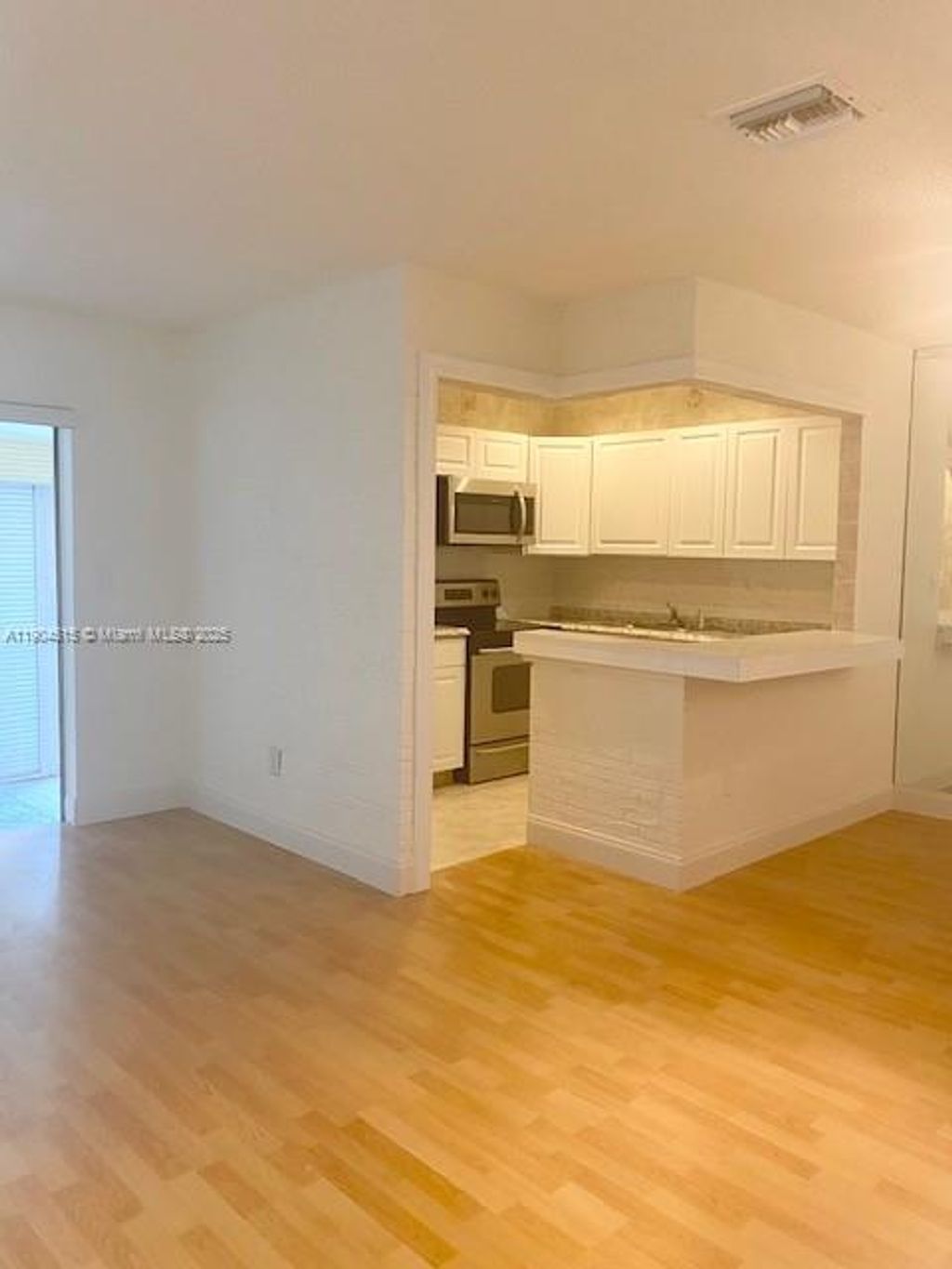 Photo of 20380 NW 7th Ave #202, Miami Gardens, FL 33169 (MLS # A11904515)