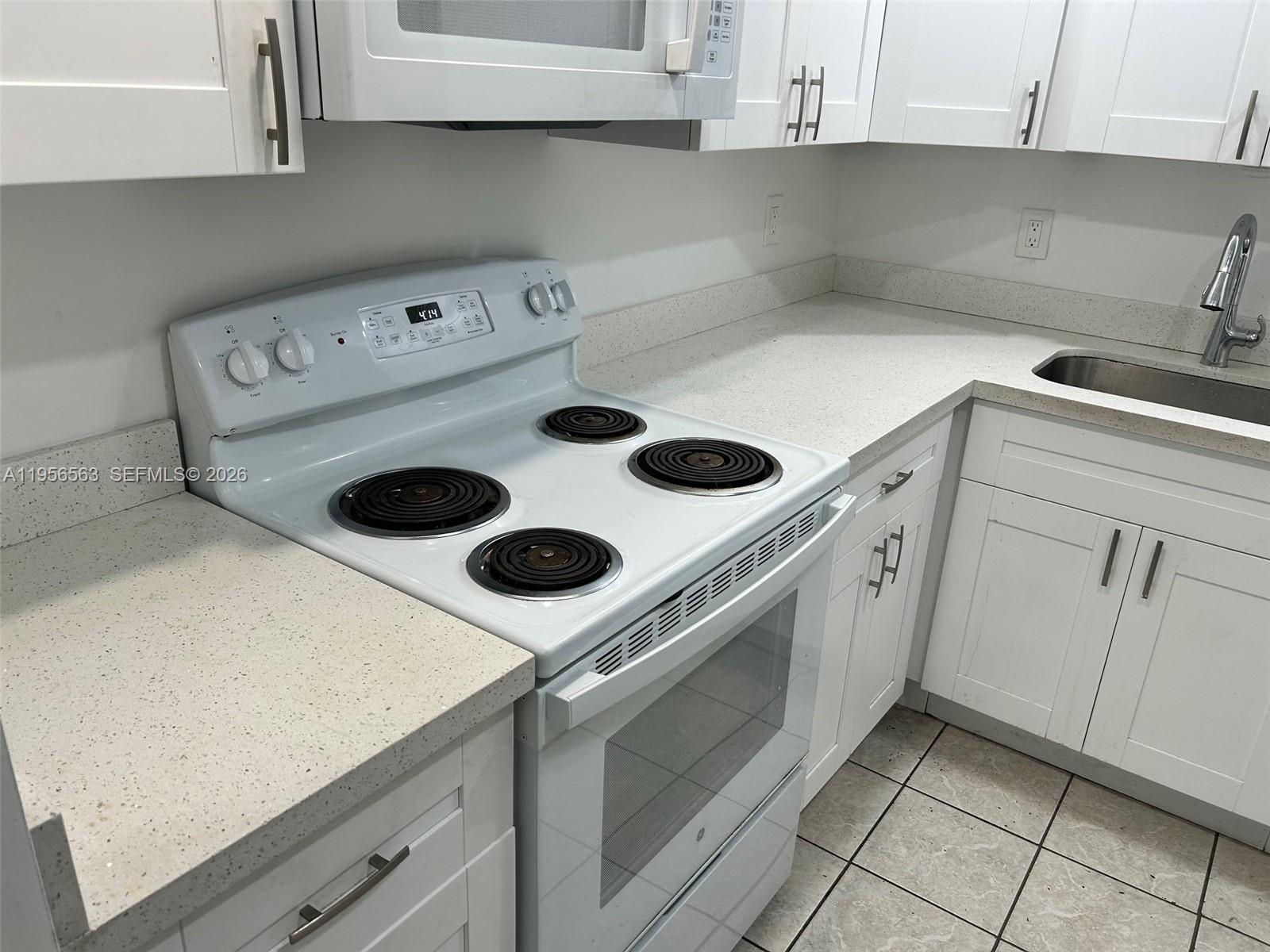 OAK TREE GARDEN CONDO - Residential