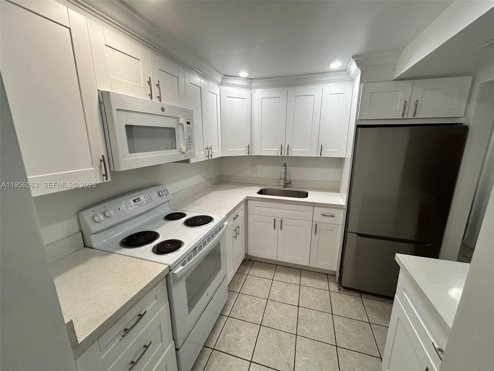 OAK TREE GARDEN CONDO - Residential