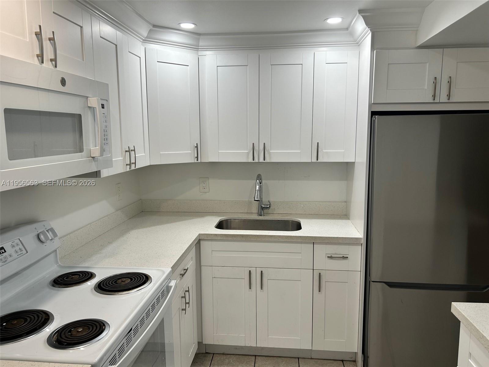 OAK TREE GARDEN CONDO - Residential