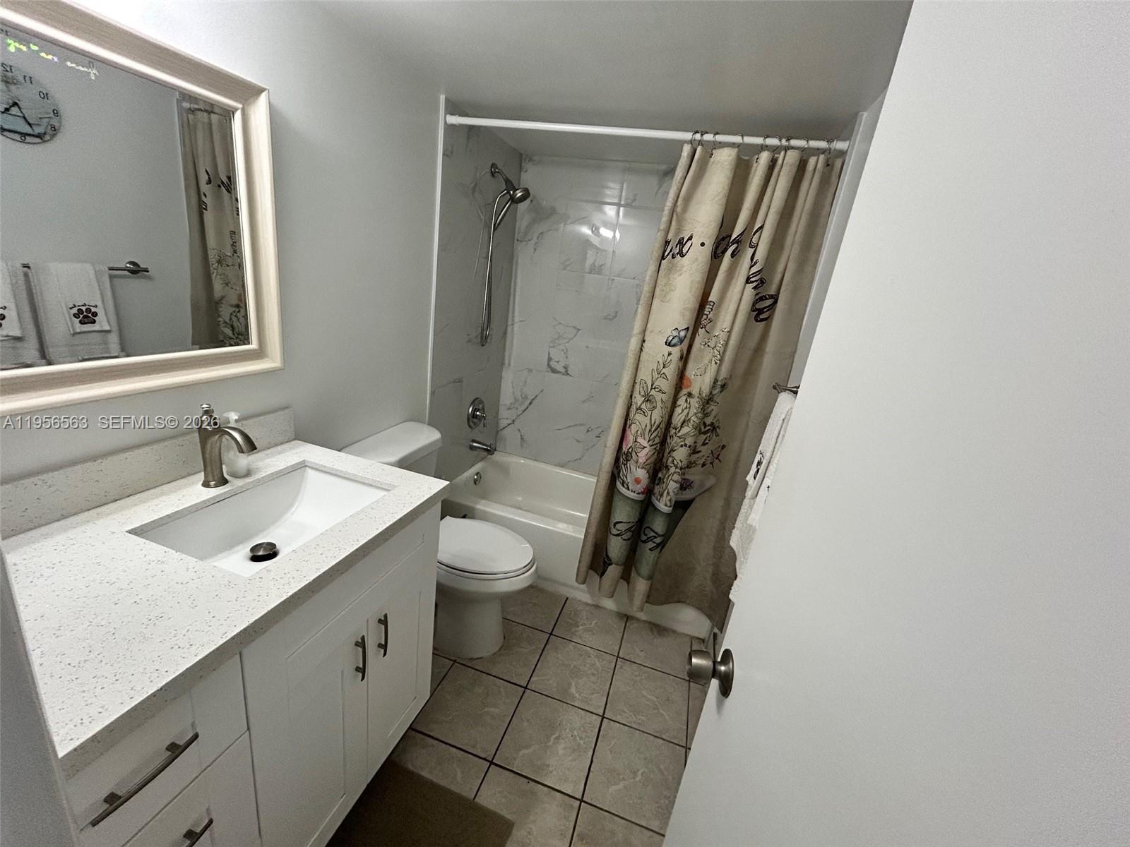 OAK TREE GARDEN CONDO - Residential