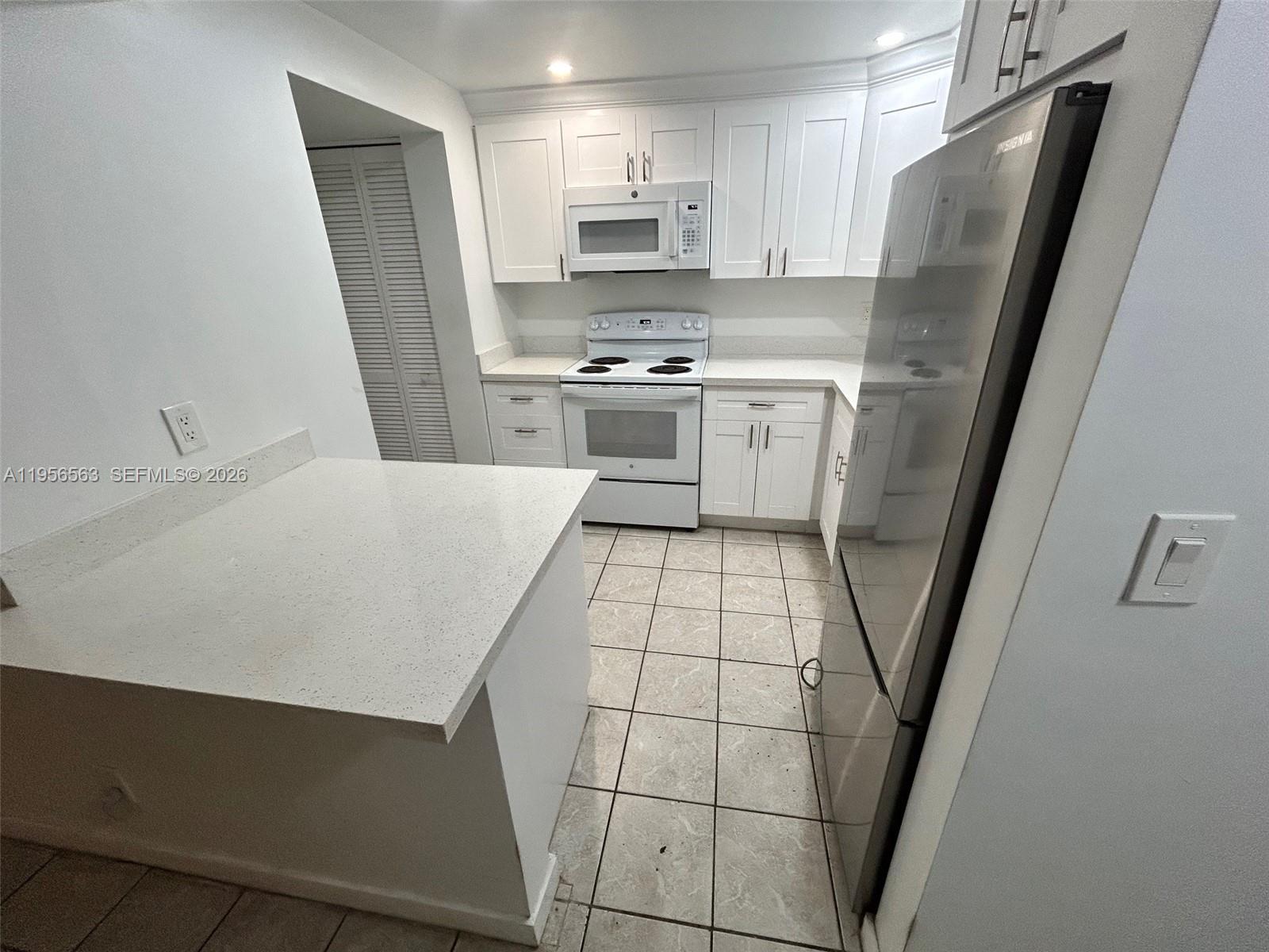 OAK TREE GARDEN CONDO - Residential