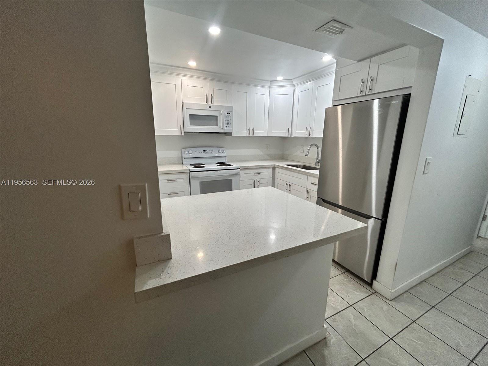 OAK TREE GARDEN CONDO - Residential