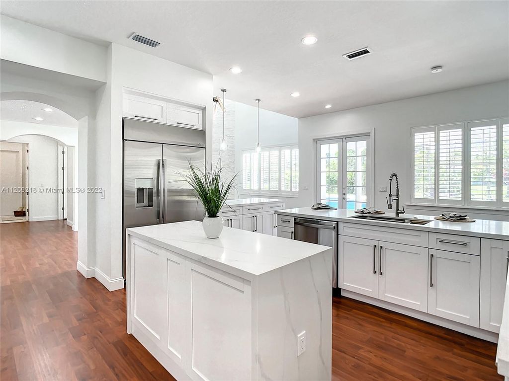 Photo of 6921 NW 63rd Way, Parkland, FL 33067 (MLS # A11259218)