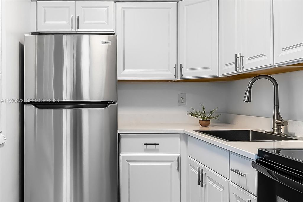 Photo of 2327 NW 52nd Ct #2327, Fort Lauderdale, FL 33309 (MLS # A11980278)