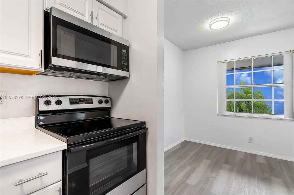 Photo of 2327 NW 52nd Ct #2327, Fort Lauderdale, FL 33309 (MLS # A11980278)