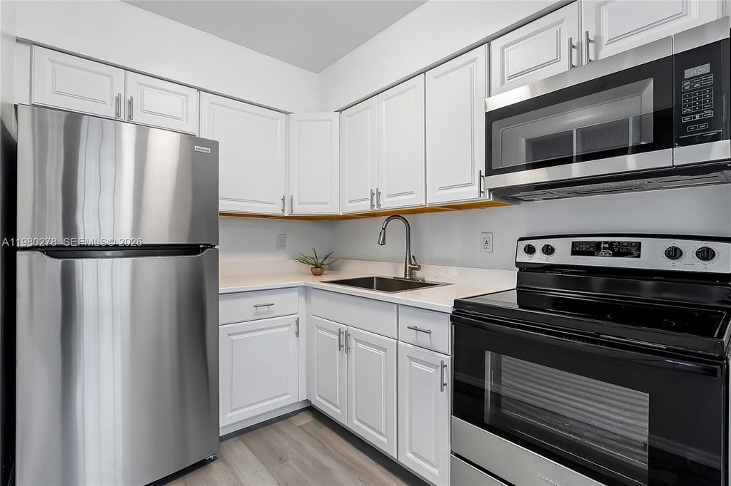 Photo of 2327 NW 52nd Ct #2327, Fort Lauderdale, FL 33309 (MLS # A11980278)