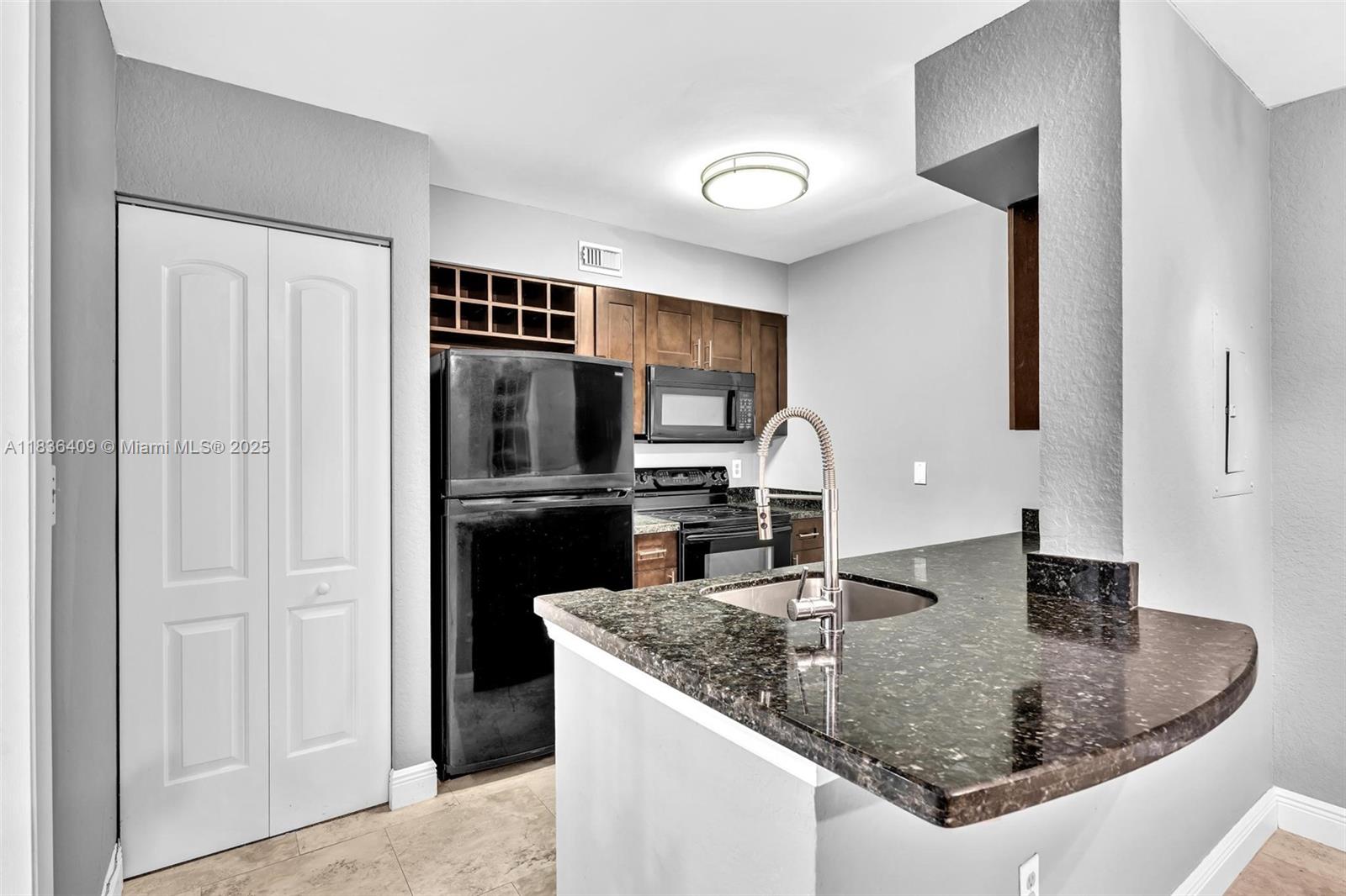 RENOVATED 1 BED 1 BATH Condo on the second floor with screened in balcony overlooking a peaceful lake. Washer and dryer in unit. Plenty of storage space. Three pools, two hot tubs, fitness center, car care center, billiards room, tennis, roving security, EV Charging stations and all within minutes of the beach and downtown. 24 Hour association approvals. Available immediately. Pets OK!