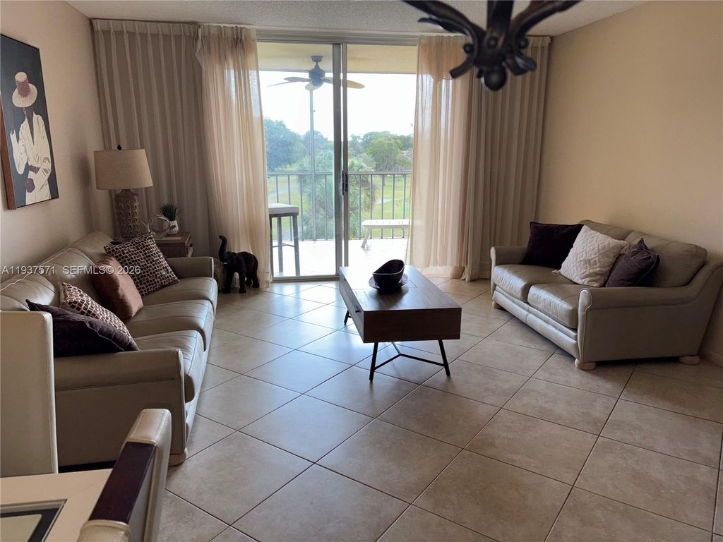 Photo of 7690 NW 18th St #408, Margate, FL 33063 (MLS # A11937571)