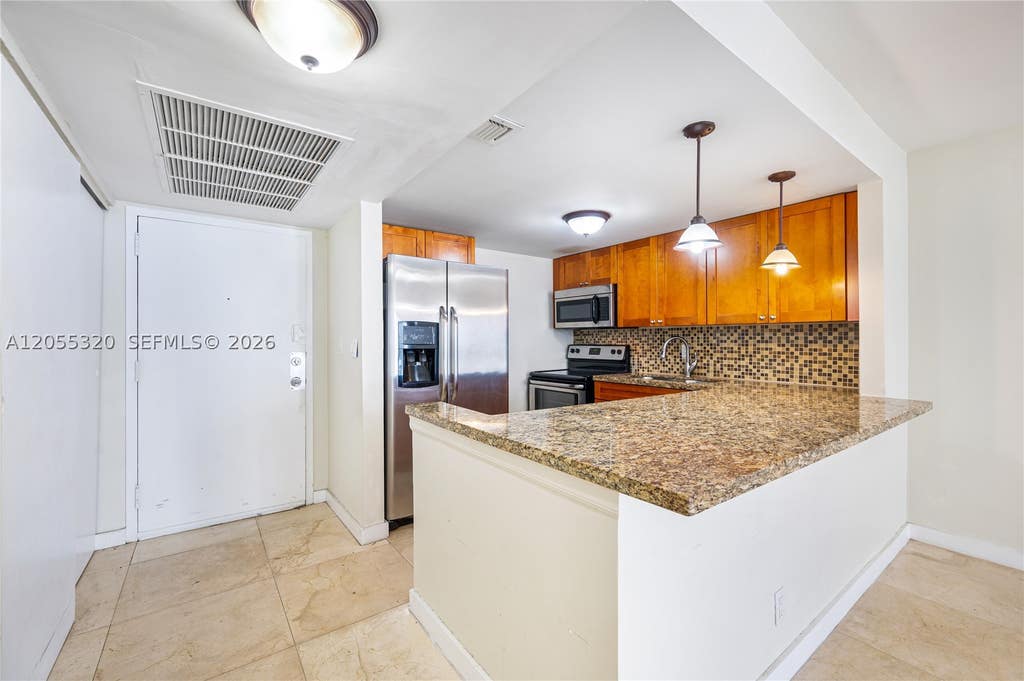 Photo of 601 Three Islands Blvd #112, Hallandale Beach, FL 33009 (MLS # A12055320)