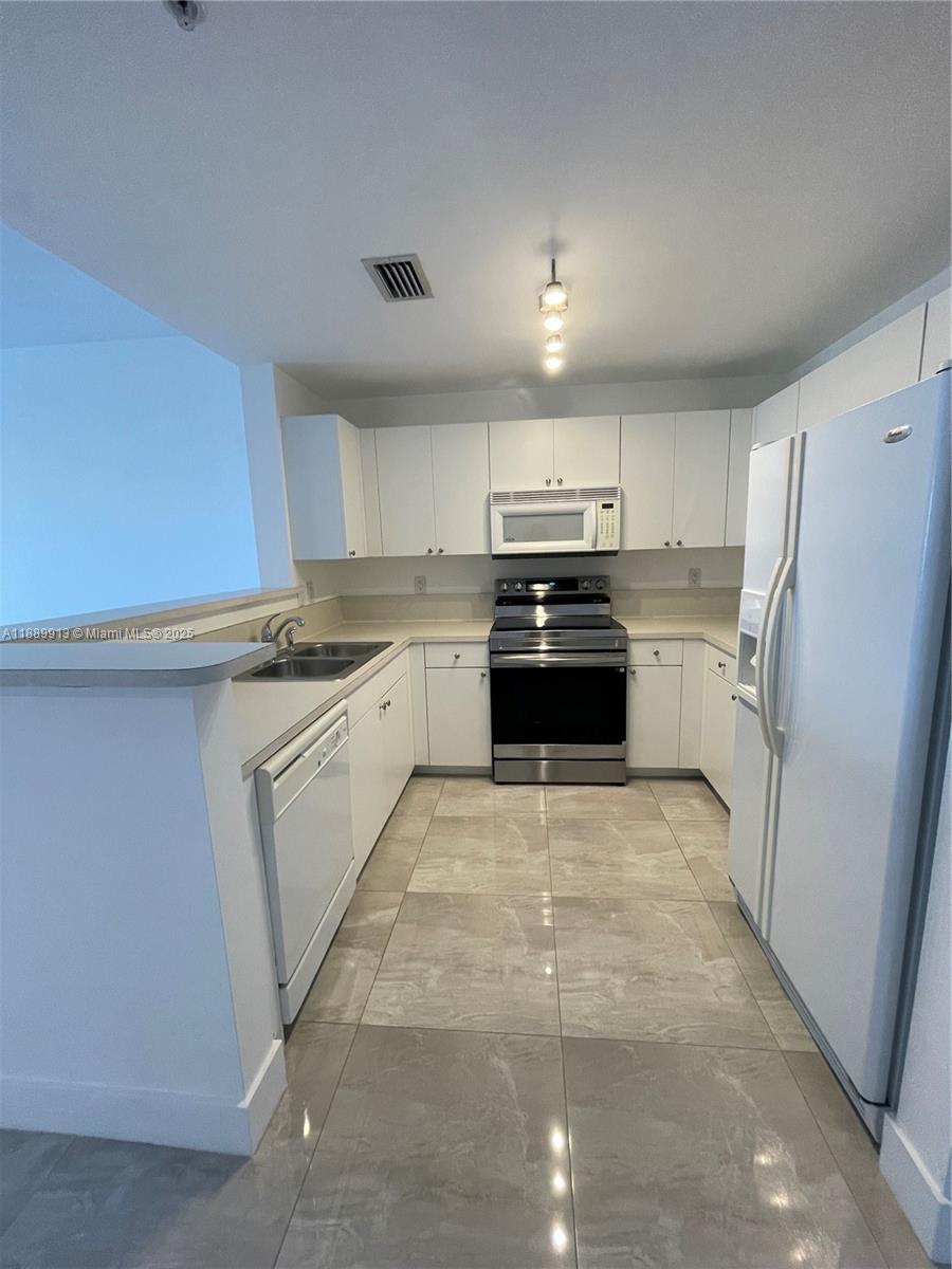 TEN ARAGON CONDO - Residential