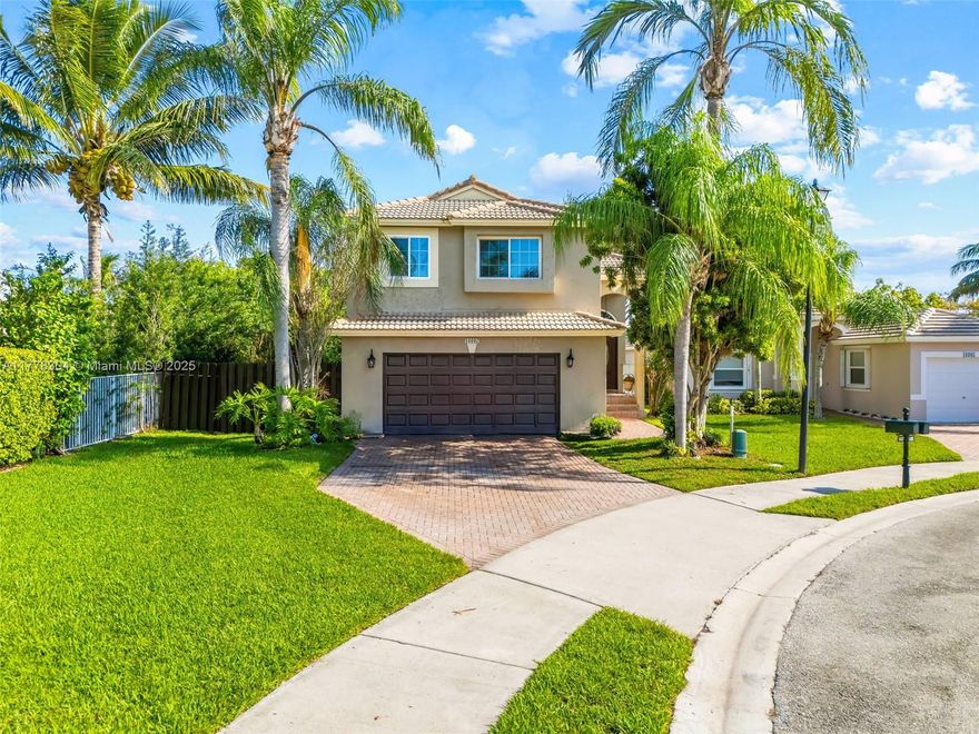 This elegant 3-bed, 2.5-bath home with a double-car garage features impact doors and windows for safety and peace of mind. The remodeled kitchen showcases new appliances, sleek quartzite countertops, and a modern layout, perfect for entertaining. The master bath offers dual showers, providing a spa-like retreat. Situated on one of the largest lots in a quiet cul-de-sac, the property boasts stunning lake views and generous outdoor space for relaxation or family activities. Community amenities include a clubhouse with a gym and pool, 24-hr security, cable, and lawn maintenance. Nearby Emerald Estate Park offers recreation with a playground, basketball, and tennis courts. Close to top-rated A+ schools and local conveniences, this home blends luxury, comfort, and location for your family.