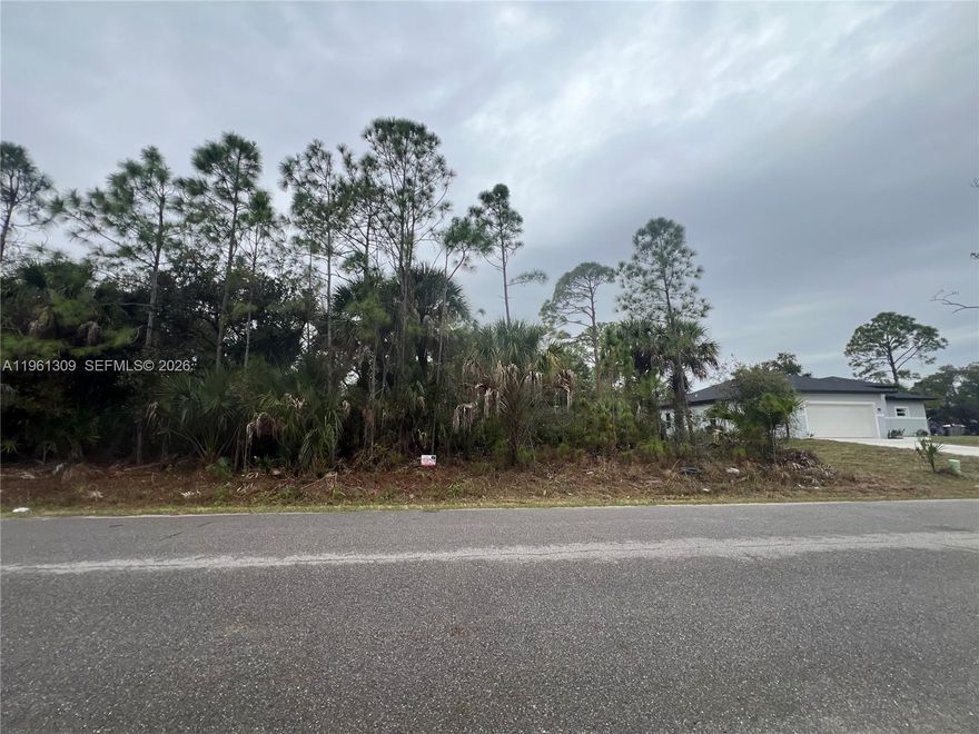 Build your dream home on this 10,000 sq ft lot in the growing community of North Port. Located in the First
Addition to Port Charlotte subdivision, this south-facing lot offers paved road access and is zoned RSF2 for single-family use. Not located in a flood zone, according to the survey. Nearby homes, schools, shopping, and easy
access to I-75. Recorded plat. Parcel ID: 0989-02-9331. Buyer to verify all zoning,
building, and utility details with Sarasota County. The survey is available.