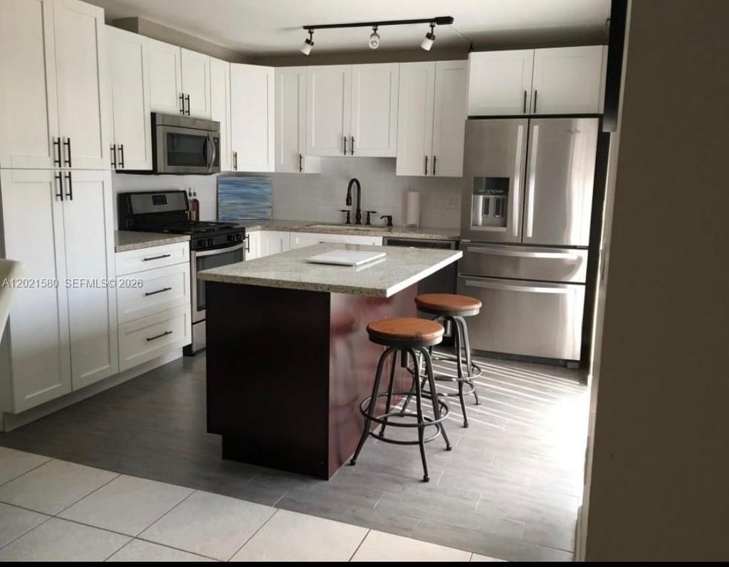 Photo of 3359 Gardens East Dr #B, Palm Beach Gardens, FL 33410 (MLS # A12021580)