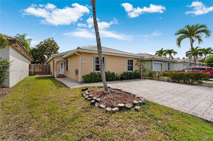 Welcome to this charming 4-bedroom, 2-bathroom single-family home in the highly desirable Hammocks community. Meticulously maintained, it features a bright, open-concept layout filled with natural light, creating a warm and inviting atmosphere throughout. The upgraded kitchen offers ample cabinetry and functionality, while updated bathrooms add modern comfort. The private backyard is perfect for relaxing or entertaining.

This move-in-ready home also includes a newer roof, a 2-year-old A/C, new blinds, and fresh interior paint. Located in a peaceful neighborhood with access to top-rated schools, scenic parks, walking trails, and desirable community amenities, it also offers convenient proximity to shopping, dining, and major highways. A turnkey opportunity you don’t want to miss.