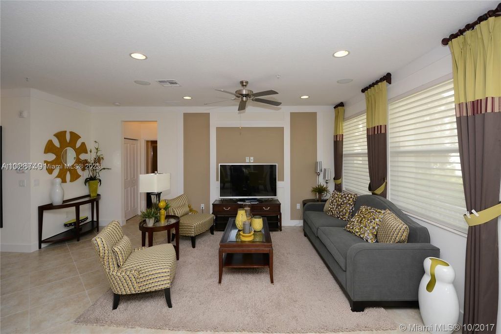 Photo of 3330 NW 126th Ter #3330, Sunrise, FL 33323 (MLS # A11384682)