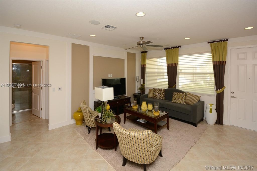 Photo of 3330 NW 126th Ter #3330, Sunrise, FL 33323 (MLS # A11384682)