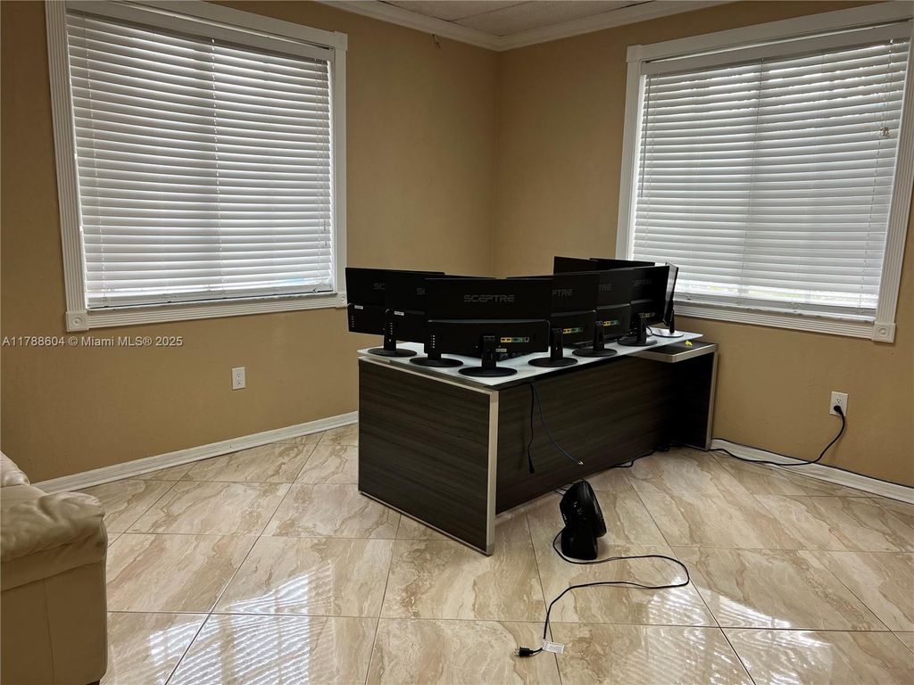 Photo of 6099 Stirling Rd #215-216, Davie, FL 33314 (MLS # A11788604)