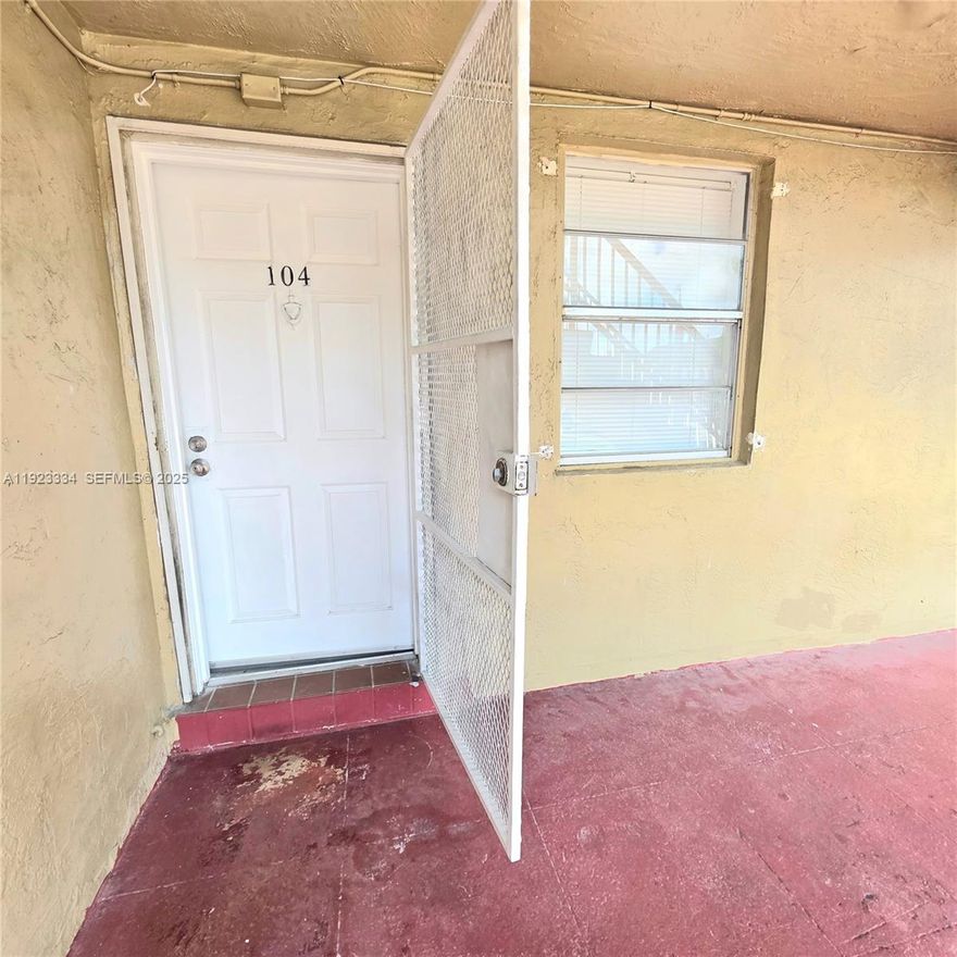 Spacious 1 bedroom 1 bath apartment, with plenty of closet space, on the ground floor with the assigned parking space in front of the unit for your convenience. Water is included in the rent. Security Gate entrance. Centrally located, a block from 441 which gives you easy access to public transportation.  Across the street from the building there is a Walmart! You don’t need to have a car to live in this building! Fast Condo approvals possible.