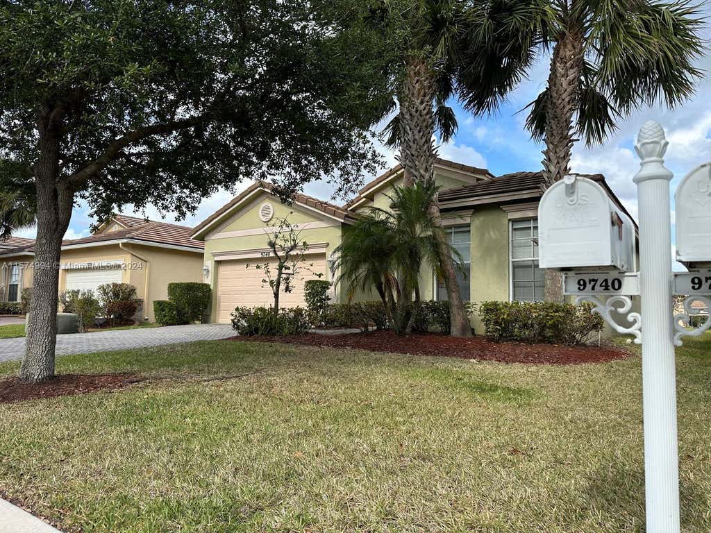 Photo of 9740 SW Lindale Trace Blvd, Port Saint Lucie, FL 34987 (MLS # A11574994)