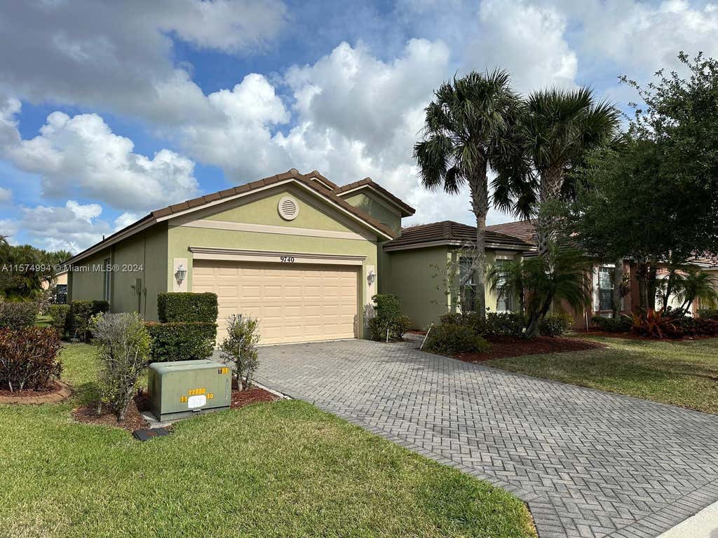 Photo of 9740 SW Lindale Trace Blvd, Port Saint Lucie, FL 34987 (MLS # A11574994)