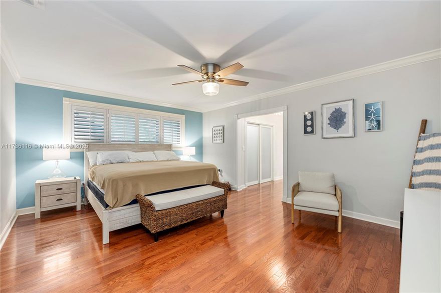 Experience breathtaking lake views from this spectacular 6bed/6bath estate, perfectly situated on a half-acre lot. This home boasts completely renovated bathrooms, a stunning new kitchen, beautifully enhanced landscaping, and a refreshed exterior. The expansive formal living room and separate dining room exude elegance, while the open-concept kitchen, breakfast area, and family room all showcase stunning views of the lake and pool/spa. A library with a sitting area, and a separate guest suite with a private entrance add to the home's impressive layout. Step outside to enjoy your tiki hut and outdoor kitchen, perfect for entertaining in style. Additional upgrades include a new roof, impact windows/doors, and Bahamian shutters throughout. A two-car garage completes this exceptional property.