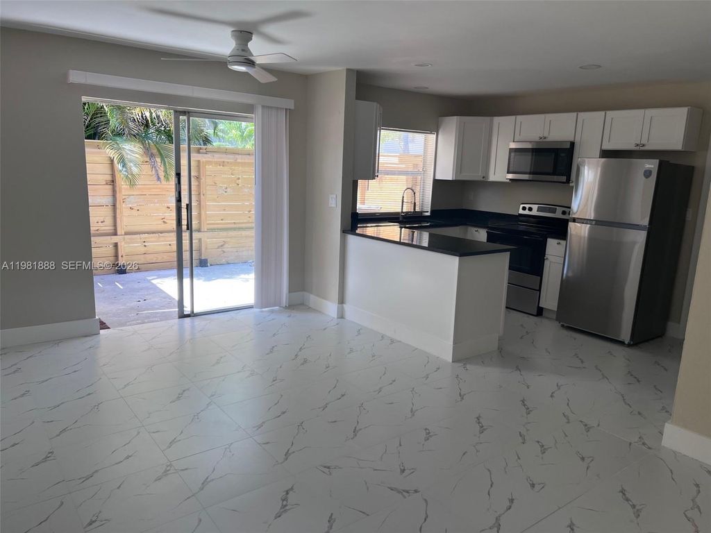 Photo of 3006 NW 4th Ter #1-142, Pompano Beach, FL 33064 (MLS # A11981888)